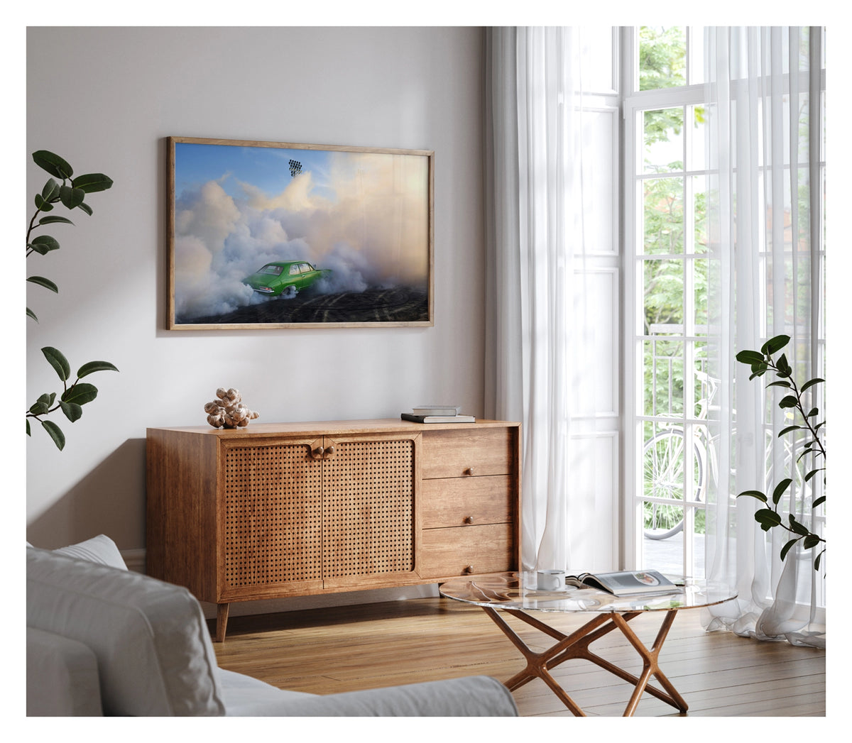 Framed in timber, hanging in living space. We see a green Holden LJ Torana sedan performing a burnout, slightly engulfed against a towering wall of white and golden tyre smoke that billows up toward a deep blue sky. Stadium flood lights pierce the haze above as the smoke catches the warm evening light, the bright green body of the car vivid against the swirling white cloud and the rubber marked black bitumen below. Fine art colour photographic print by Simon Davidson.