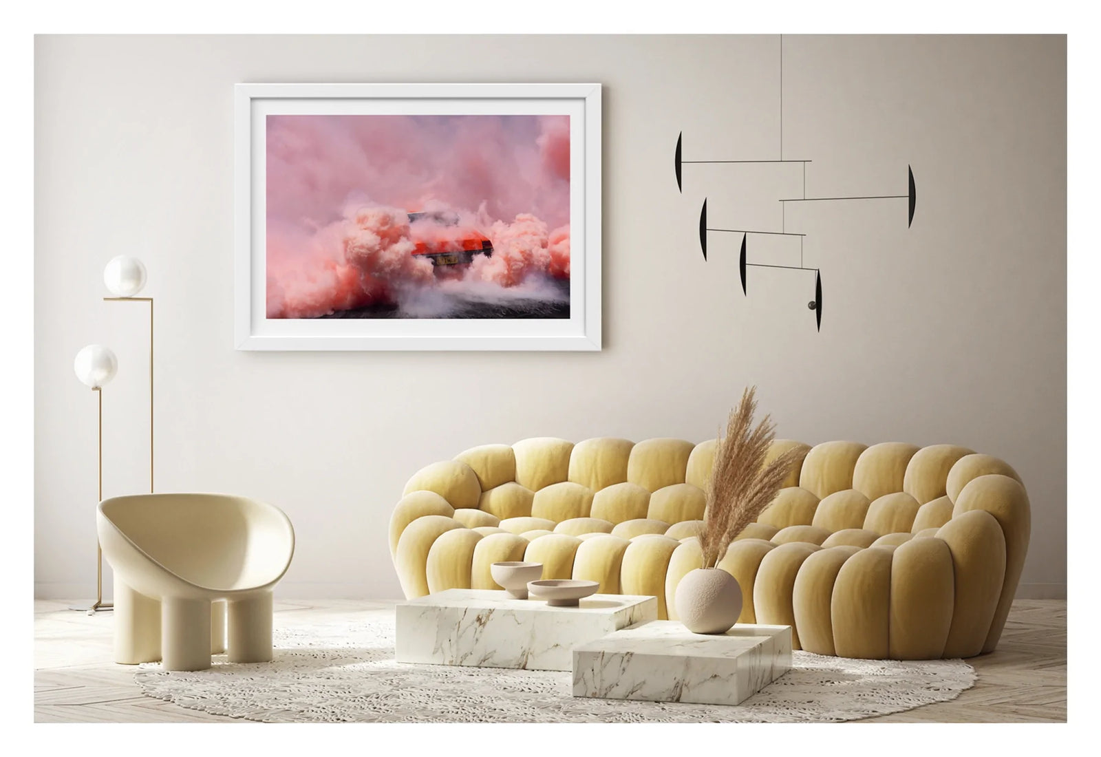 Framed in white, shown in a contemporary living scene. We see a orange Holden sedan bearing the number plate LITMUP performing a burnout, the car almost entirely consumed by the vast churning cloud of pink/orange tyre smoke that fills the whole frame. The roofline and rear window are just visible through the enveloping haze as pink smoke billows in every direction across the velvety black bitumen below. Fine art colour photographic print by Simon Davidson.