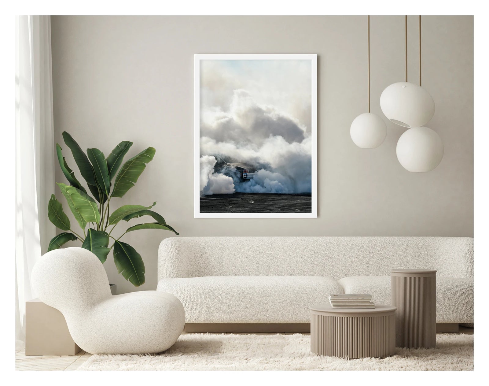 Framed in white, displayed in a contemporary living space. We see rear of a black Holden GTS sedan is almost entirely swallowed by a towering cloud of white tyre smoke during a burnout, with only the red tail light and rear chrome bumper visible through the billowing haze. The smoke builds into a massive marshmallow like formation that fills the frame from the black bitumen covered in burnout detritus to the pale sky above, dwarfing the car beneath it. Fine art colour photographic print by Simon Davidson.
