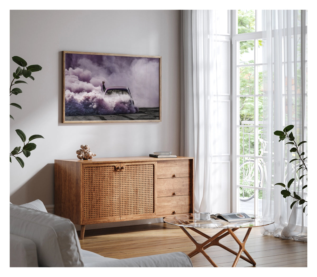 Framed in timber, shown in a contemporary living space we see a purple Torana as it slides through the scene, rear to camera, is all but consumed by a vast billowing cloud of vivid purple smoke, with a passenger's arm thrust through the window throwing devil horns above the roofline as the only sign of human life within the haze. Fine art colour photographic print by Simon Davidson.