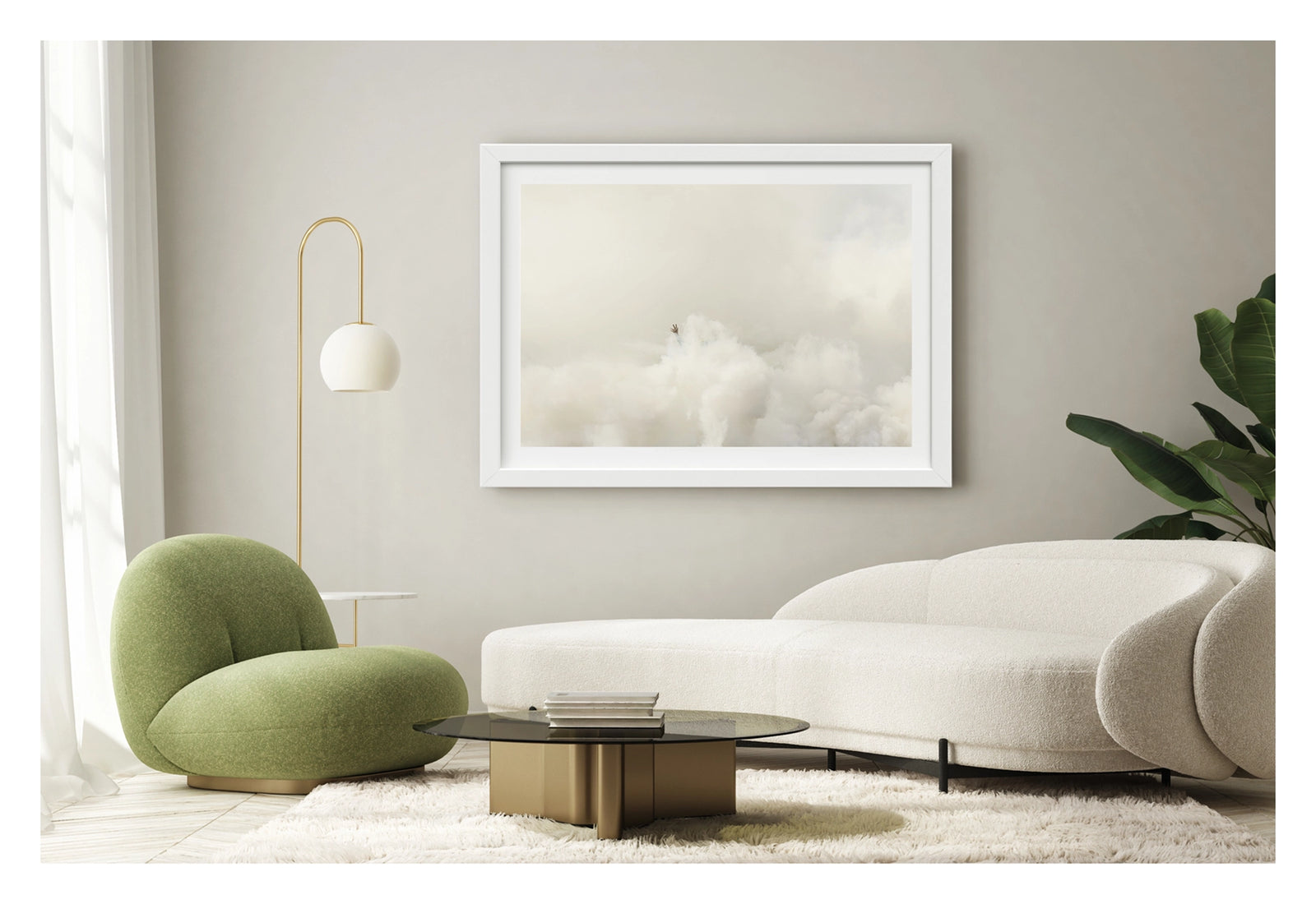 Framed in white, shown in a contemporary living space. A single human hand reaches up from a vast rolling sea of white tyre smoke, fingers splayed open against a pale hazy sky, the rest of the body completely swallowed by the billowing cloud below. The minimalist composition and vast expanse of white smoke give the image an almost surreal, painterly quality. Fine art colour photographic print by Simon Davidson.