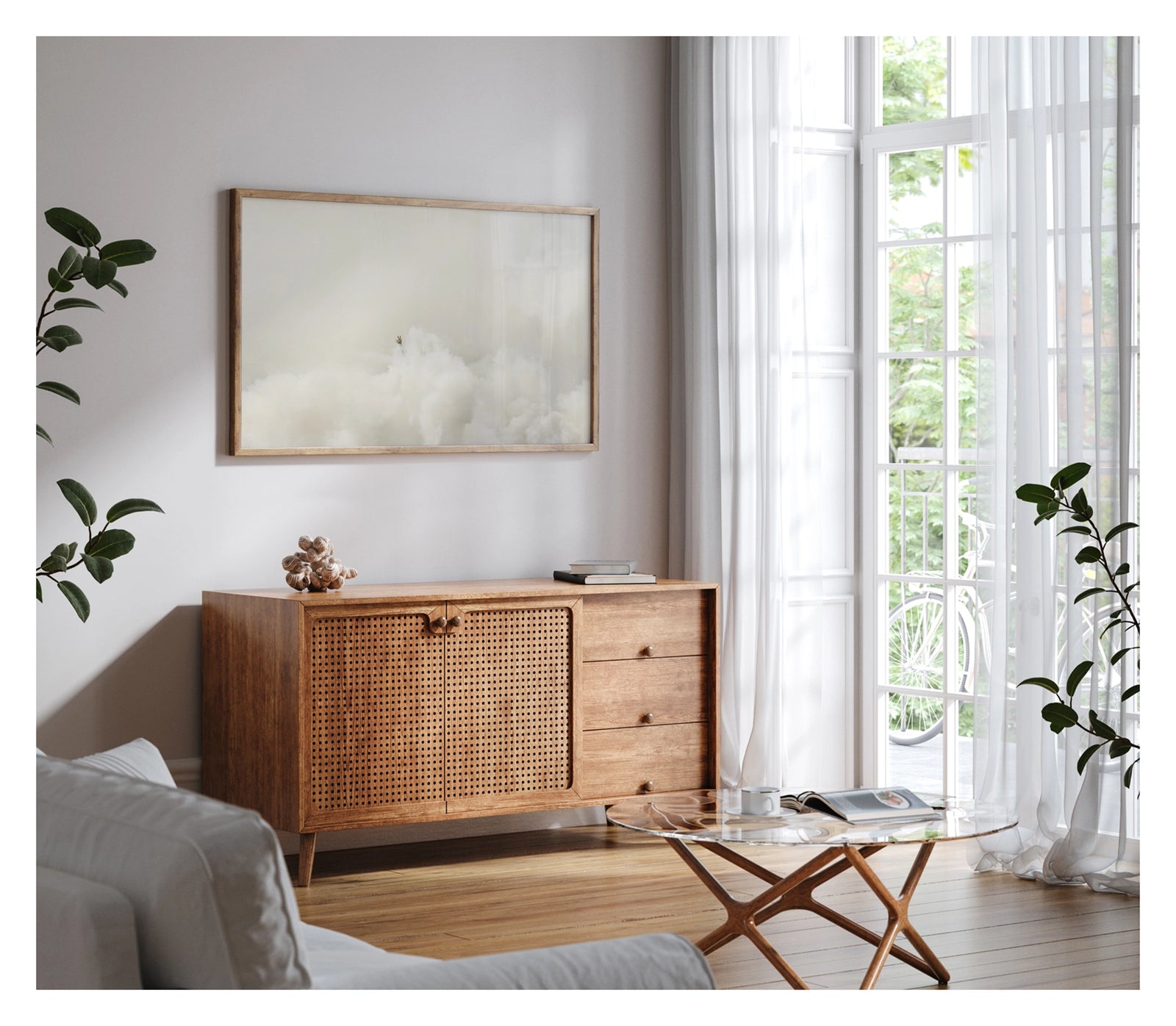 Framed in timber, shown in a contemporary living space. A single human hand reaches up from a vast rolling sea of white tyre smoke, fingers splayed open against a pale hazy sky, the rest of the body completely swallowed by the billowing cloud below. The minimalist composition and vast expanse of white smoke give the image an almost surreal, painterly quality. Fine art colour photographic print by Simon Davidson.